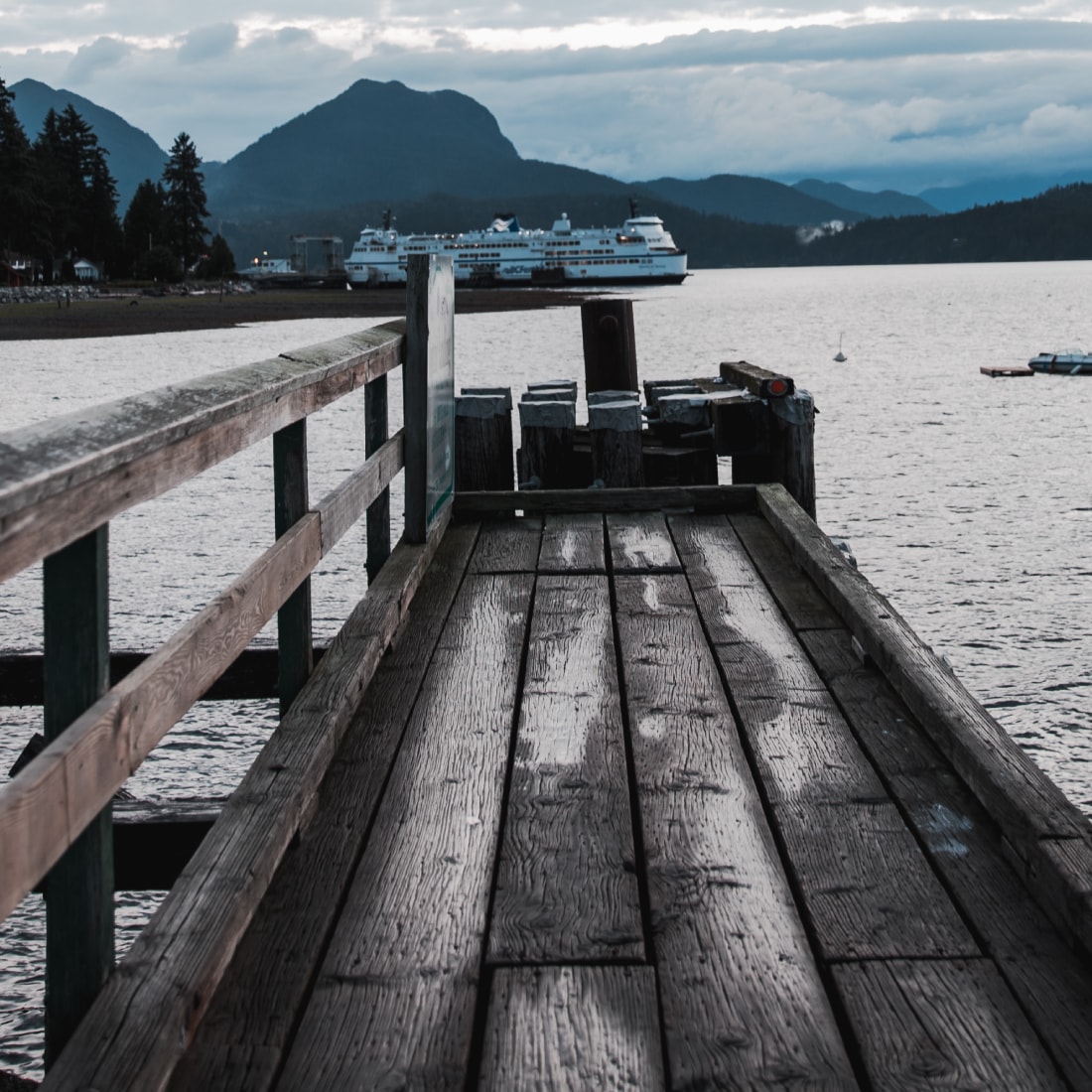 Watching a ferry from a dock on Vancouver Island